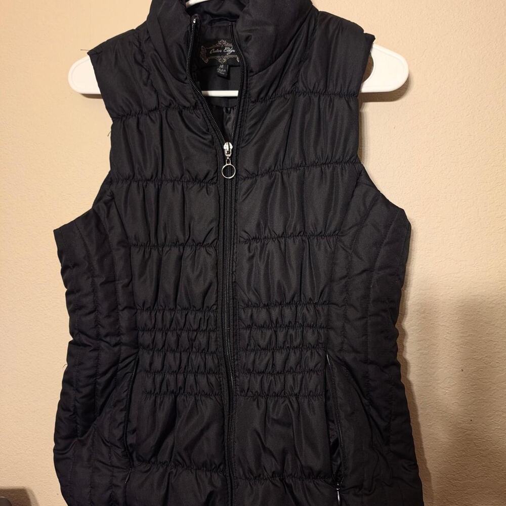 Outer edge black puffer vest